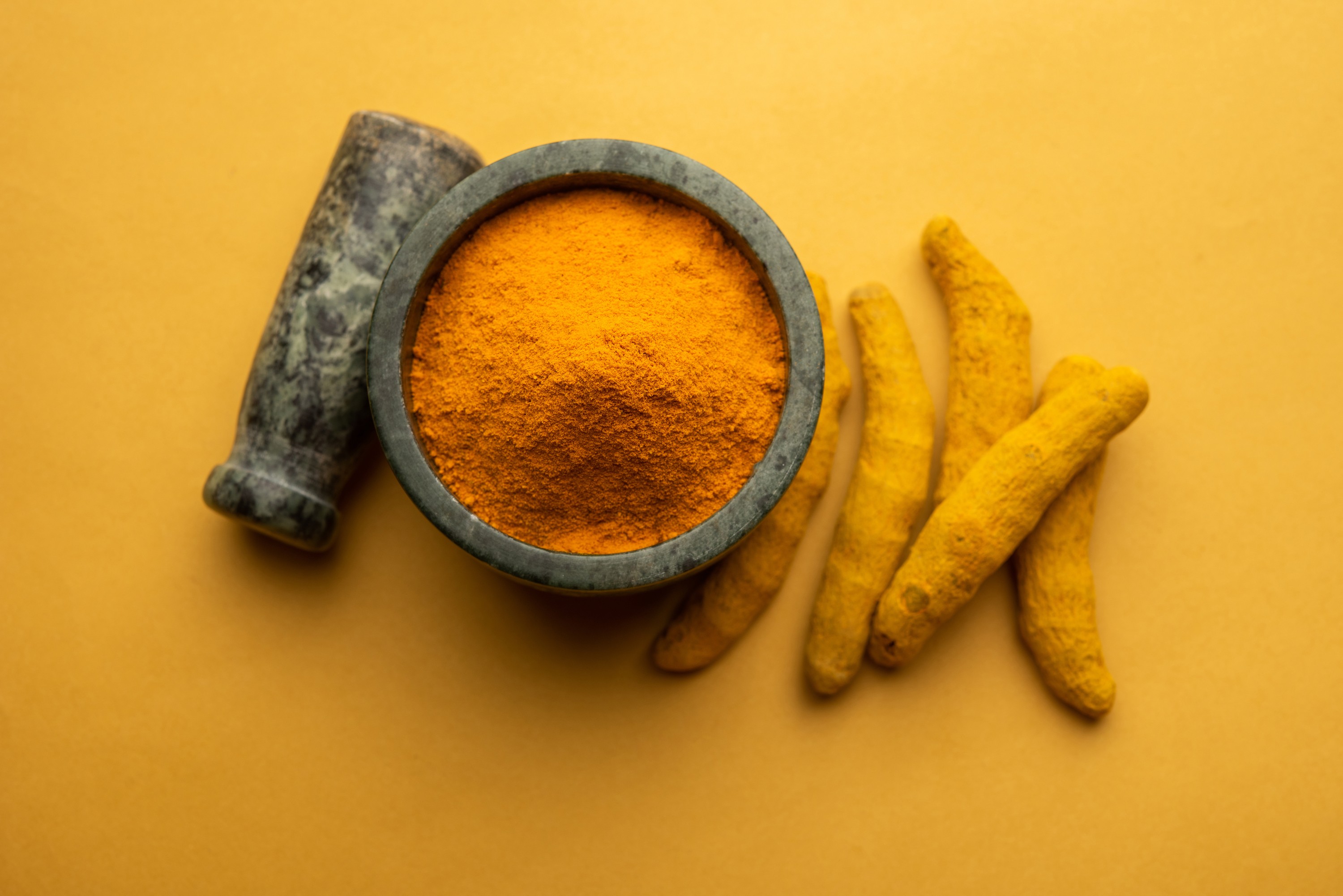 Dry turmeric dust haldi powder also known as curcuma longa linn selective focus (1)